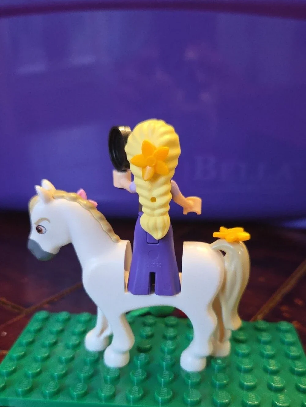 LEGO Rapunzel mini figure riding her horse, Maximus.